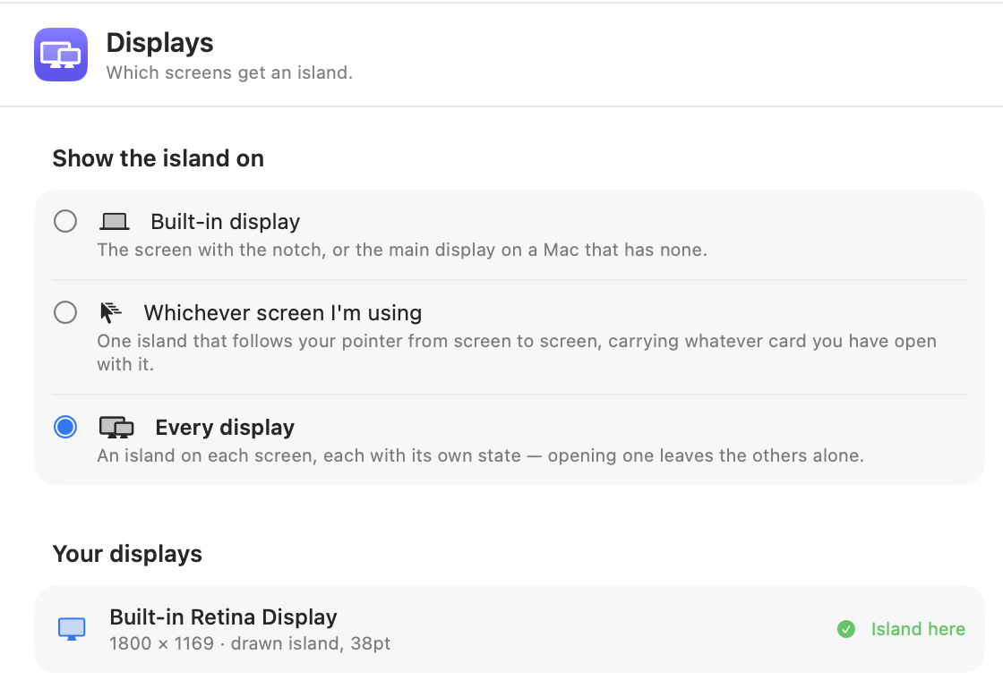 The Displays pane in Settings, choosing which screens get an island